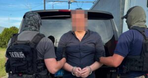 Передача екстрадованого екснардепа українським правоохоронцям, фото Руслана Кравченка